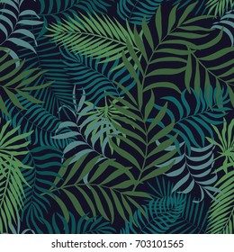 Tropical background with palm leaves. Seamless floral pattern