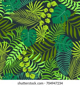 Tropical background with palm leaves. Seamless floral pattern