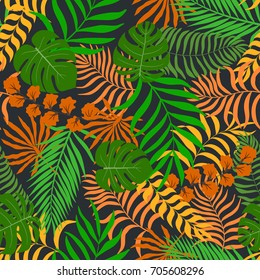 Tropical background with palm leaves. Seamless floral pattern