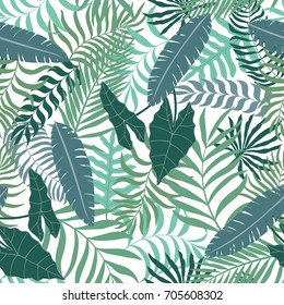 Tropical background with palm leaves. Seamless floral pattern