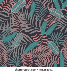 Tropical background with palm leaves. Seamless floral pattern