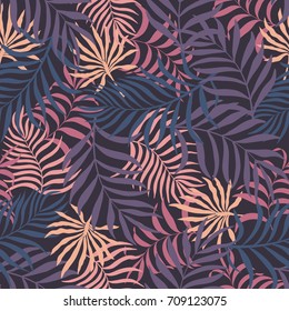 Tropical background with palm leaves. Seamless floral pattern