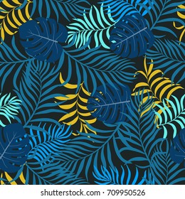 Tropical background with palm leaves. Seamless floral pattern