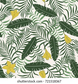 Tropical background with palm leaves. Seamless floral pattern