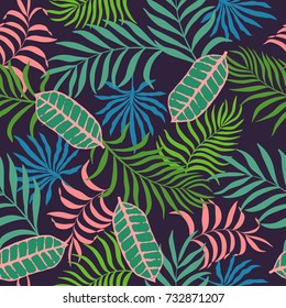 Tropical background with palm leaves. Seamless floral pattern