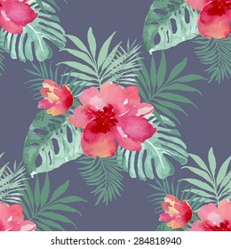 Tropical background with red flowers and palm leaves. Seamless watercolor pattern, vector.