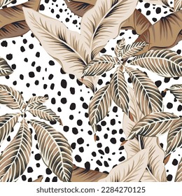 Tropical banana palm leaves, cheetah spots animal print background. Seamless pattern. Vector illustration. Exotic plants. Summer beach floral design