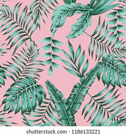 Tropical banana palm leaves green colors seamless pattern on the pink background