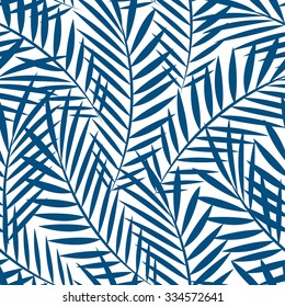 Tropical blue palm tree leaves in a seamless pattern .