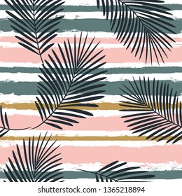 Tropical boho pattern, palm leaves seamless  background. Exotic plant on stripes print illustration. Summer beach jungle print. Leaves of palm tree on paint lines. ink brush strokes - Vector