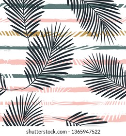 Tropical boho pattern, palm leaves seamless  background. Exotic plant on stripes print illustration. Summer beach jungle print. Leaves of palm tree on paint lines. ink brush strokes - Vector