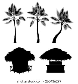 Tropical bungalow and palm