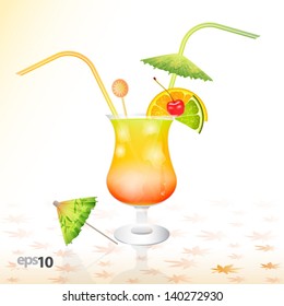 Tropical cocktail in glass with ice and umbrella