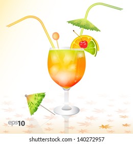 Tropical cocktail in glass with ice and umbrella