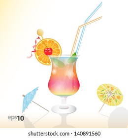 Tropical cocktail in glass with ice and umbrella