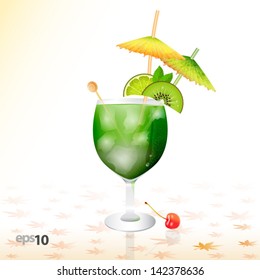 Tropical cocktail in glass with ice and umbrella