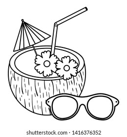 tropical coconut cocktail and sunglasses