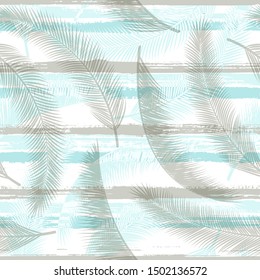Tropical coconut palm leaves tree branches over painted stripes seamless pattern design. Indonesian jungle foliage beach fashion fabric print. Stripes and tropical leaves illustration.