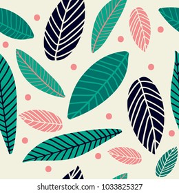 Tropical colored leaves seamless repeating background pattern. Colors of green, navy blue, ivory and pink