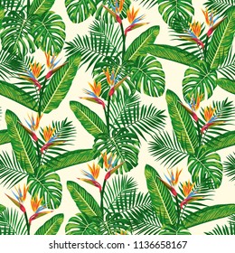 Tropical design featuring Palm Fronds, Monstera Leaves and Bird of Paradise Flowers. Seamless vector pattern background.