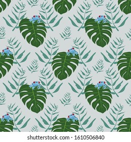 Tropical diamond array repeat seamless pattern of leaves and blue tree frogs on green background.
