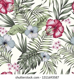 Tropical exotic flowers hibiscus, frangipani (plumeria) and palm, banana leaves composition. Vector seamless pattern on the white background