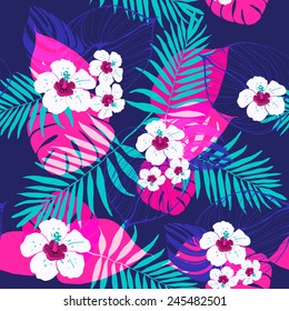 Tropical exotic flowers and leaves seamless pattern. 