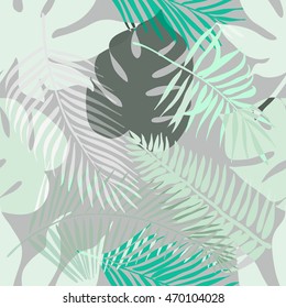 Tropical exotic flowers and plants with green leaves of palm. Seamless pattern. Fashion vintage summer wallpaper.