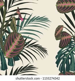 Tropical exotic plants seamless pattern, palm leaves. Decoration on light yellow background. Colorful exotic rainforest wallpaper.
