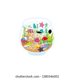 Tropical fish and coral in an aquarium fishbowl