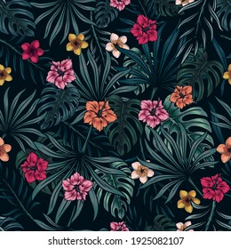 Tropical floral colorful seamless pattern with exotic leaves and flowers on dark background vector illustration