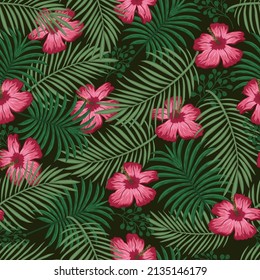 Tropical floral colorful seamless pattern on a black background with beautiful flowers green palm leaves vector illustration