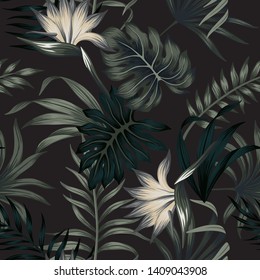 Tropical floral foliage dark green palm leaves, strelitzia seamless pattern black background. Exotic jungle night wallpaper.