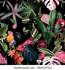 Tropical floral print. Parrot bird in the jungle with colored leaves, fruit and flowers in the dark exotic forest, seamless pattern for fashion, wallpaper and all prints on black backdrop.