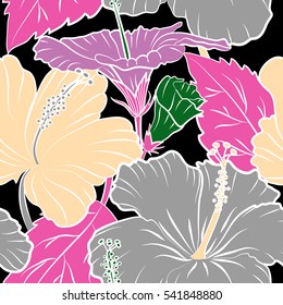 Tropical floral seamless pattern with hibiscus flowers in green, violet and pink colors. Floral vector on a black background.