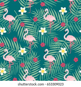 Tropical flowers background. Trendy seamless pattern with pink flamingo, flower and tropical leafs. Beach background. Tropical paradise