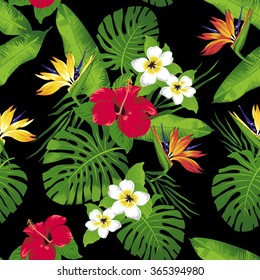 Tropical flowers and leaves on black background. Seamless. Vector.