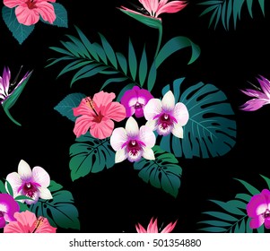 Tropical flowers and leaves on black background. Seamless. Vector.