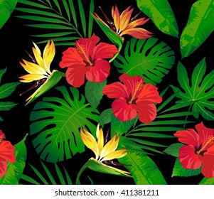 Tropical flowers and leaves on blue background. Seamless. Vector.