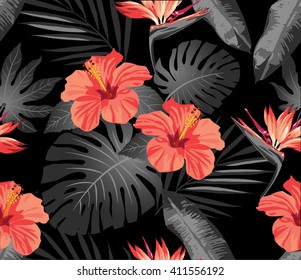 Tropical flowers and leaves on dark gray background. Seamless. Vector.