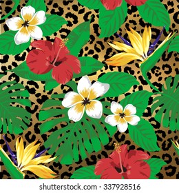 Tropical flowers and leaves on leopard background. Seamless. 