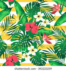 Tropical flowers and leaves on striped background. Seamless. Vector.