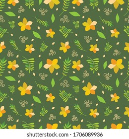 Tropical flowers and leaves in orange, yellow on green background repeat pattern. Jungle flora seamless vector design. Great for fabrics, wallpaper, backgrounds, packaging design. Surface design.