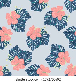 Tropical flowers and leaves of plants jungle vector seamless pattern. Exotic floral print for swimsuits, fabrics, wallpapers. Floral background with ethnic leaves and flowers.