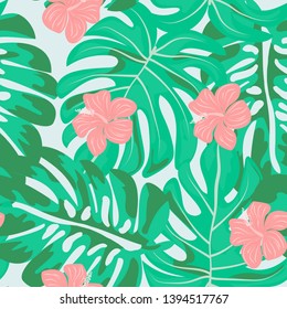 Tropical flowers and leaves of plants jungle vector seamless pattern. Exotic floral print for swimsuits, fabrics, wallpapers. Floral background with ethnic leaves and flowers.