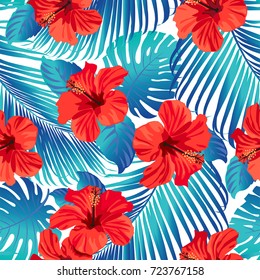 Tropical flowers and palm leaves on background. Seamless. Vector pattern.