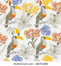 Tropical flowers and toucan birds.Seamless pattern.