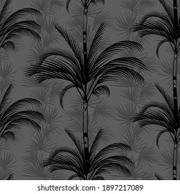 tropical gray pattern with silhouettes of palm trees on the background of bushes for design textiles and surfaces