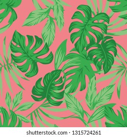 Tropical green leaves on the living coral background. Seamless vector pattern