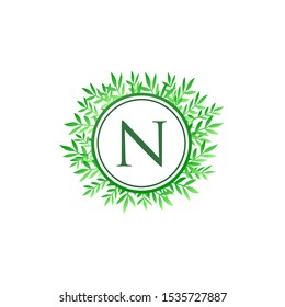 Tropical Green Leaves Vector Logo Letter N. Circle N Letter Design Vector Green Leaves Tropical Logo Icon.